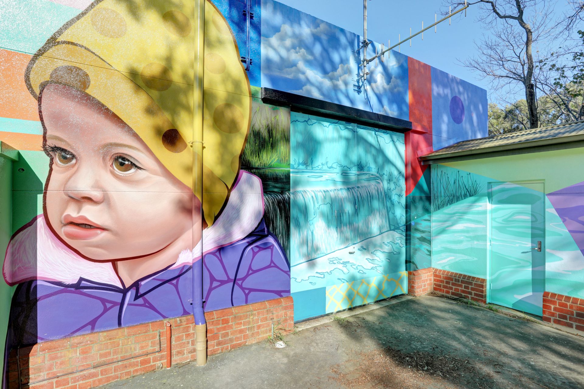 The Torrens Park Pump Station mural featuring our next generation n the northern side of the Torrens Park Pump Station