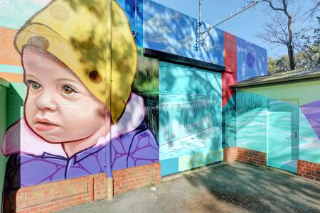 The Torrens Park Pump Station mural featuring our next generation n the northern side of the Torrens Park Pump Station