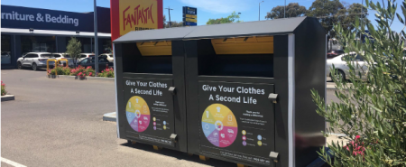 A collection bin at a shopping centre to drop your clothing donations into