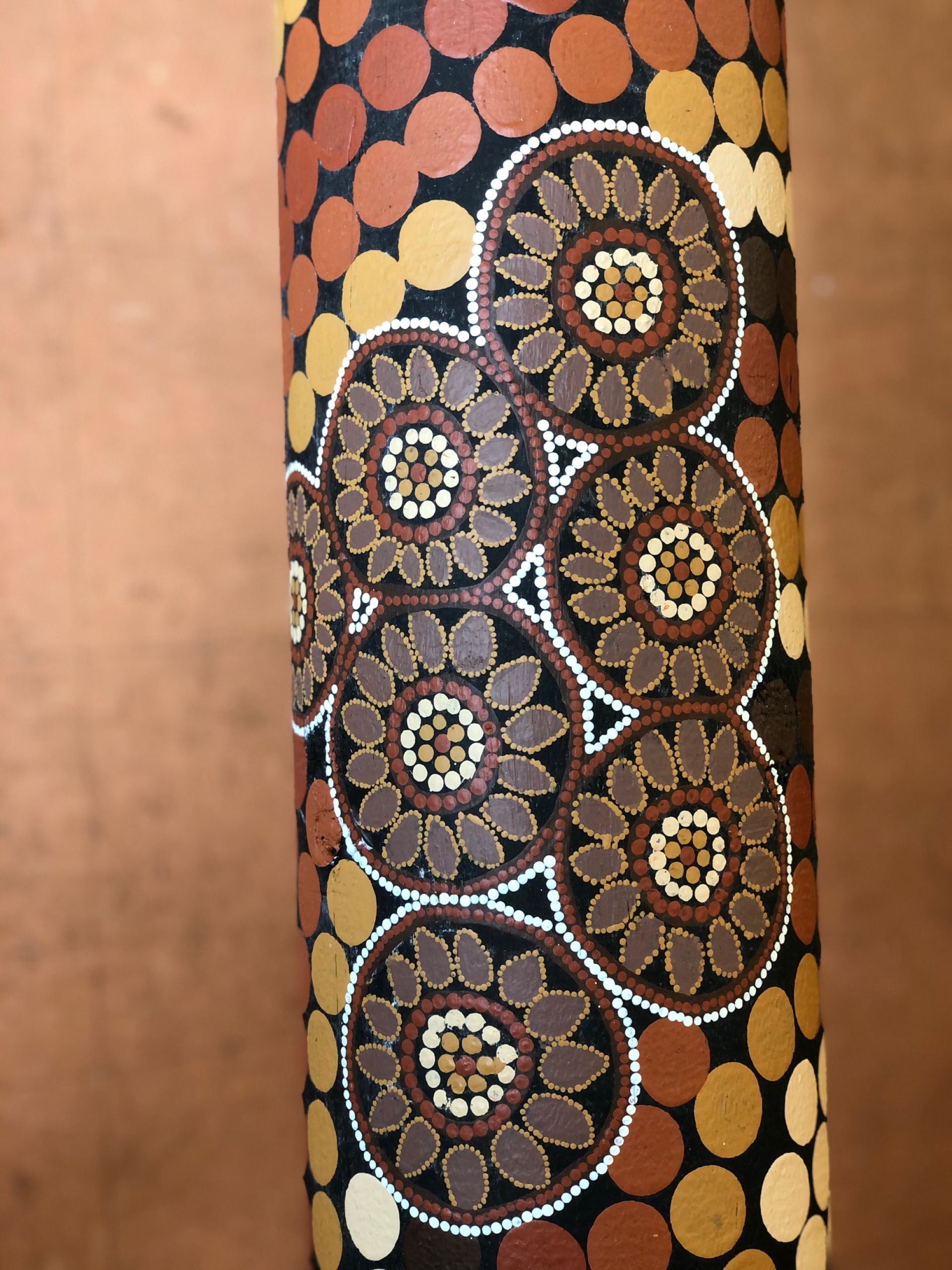A pole displaying the Spiritual Grounding art work by Marra Dreaming