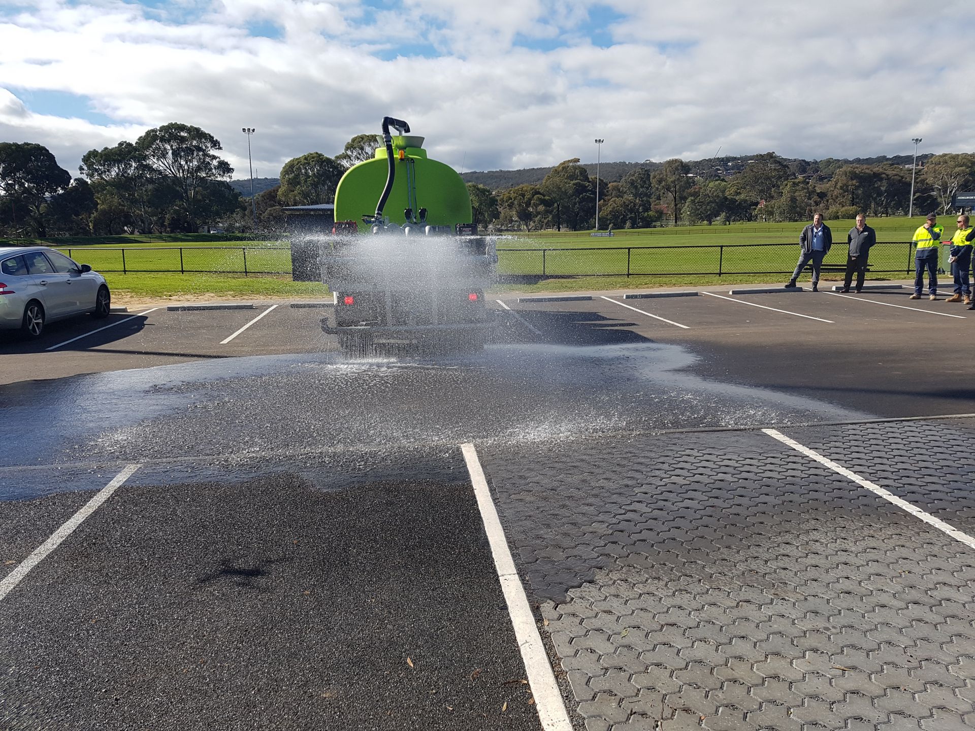 Water soaking into the permeable paving at St Marys Park