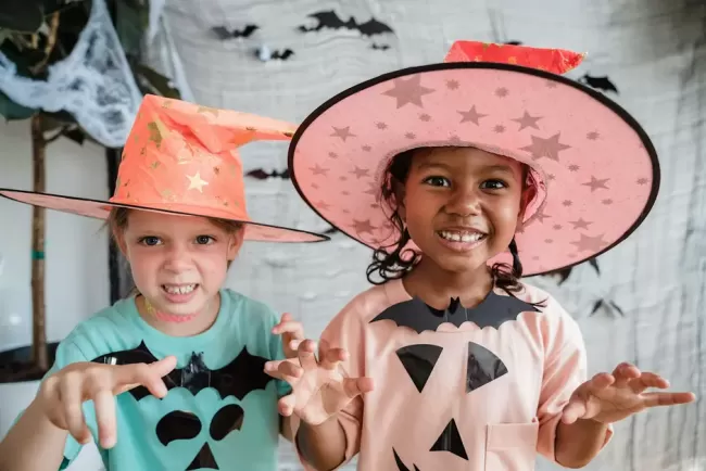 Two children dressed up for Halloween fun