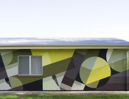 A mural in green earth colours painted on the Pasadena tennis Club rooms