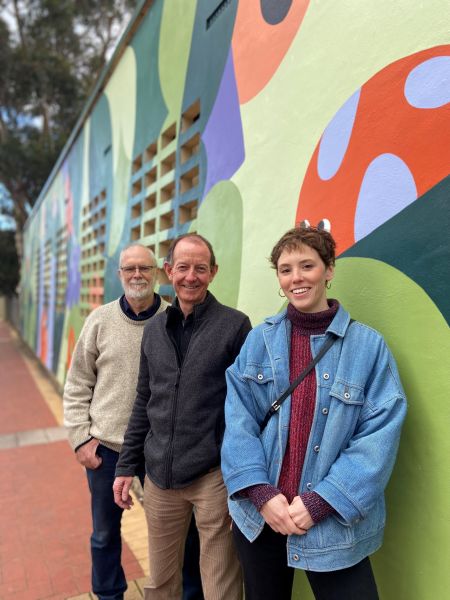 The Walk mural pictured with artist Cecile Gariepy with Blackwood Uniting Church member Peter Cranwell, who helped instigate the project, and Minister Michael Dowling